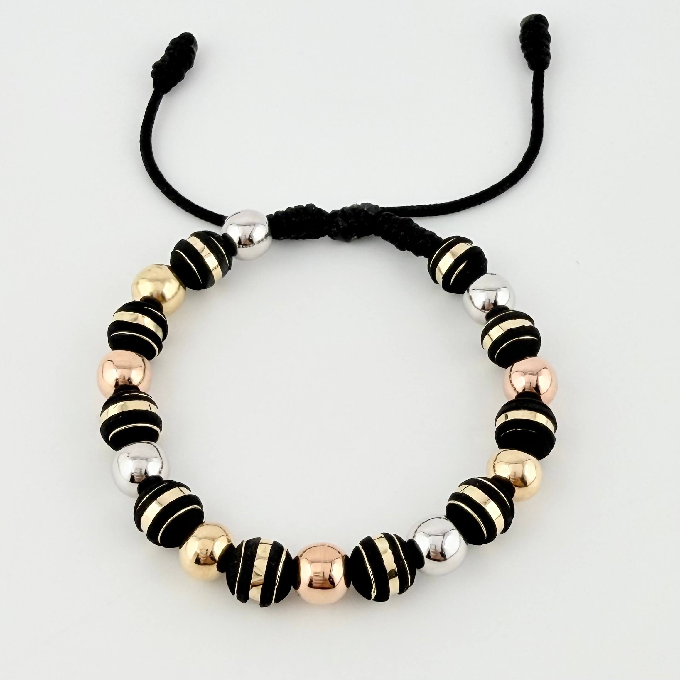 Pulsera Negra Neoros 10und Bolas 10und 3.1gr / 8mm Tres Oros 18K ©