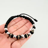 Pulsera Negra Neoros 4und Bolas 7und / 7mm-8mm Dos Oros Amarillo Blanco 18K *