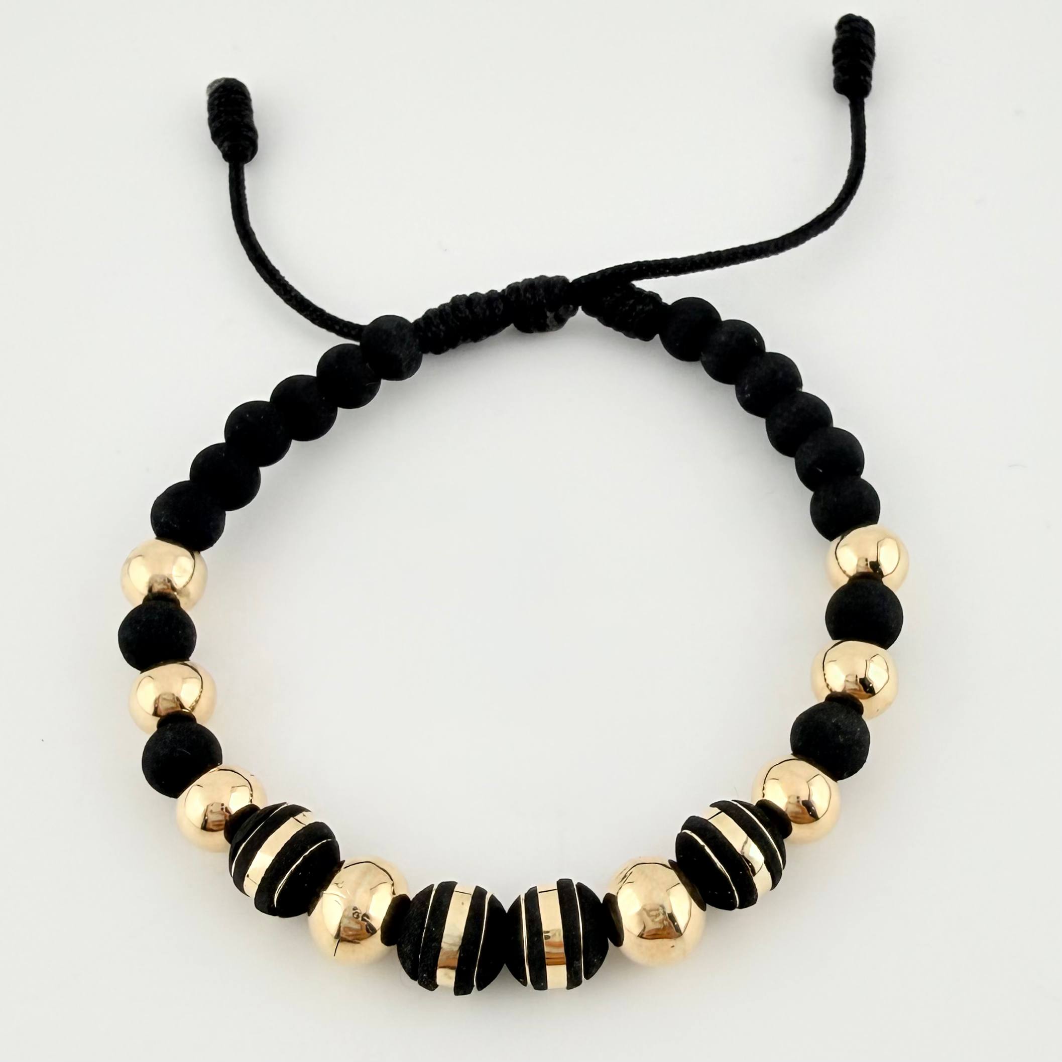 Pulsera Negra Neoros 4und Bolas 8und / 7mm-8mm Oro Amarillo 18K *
