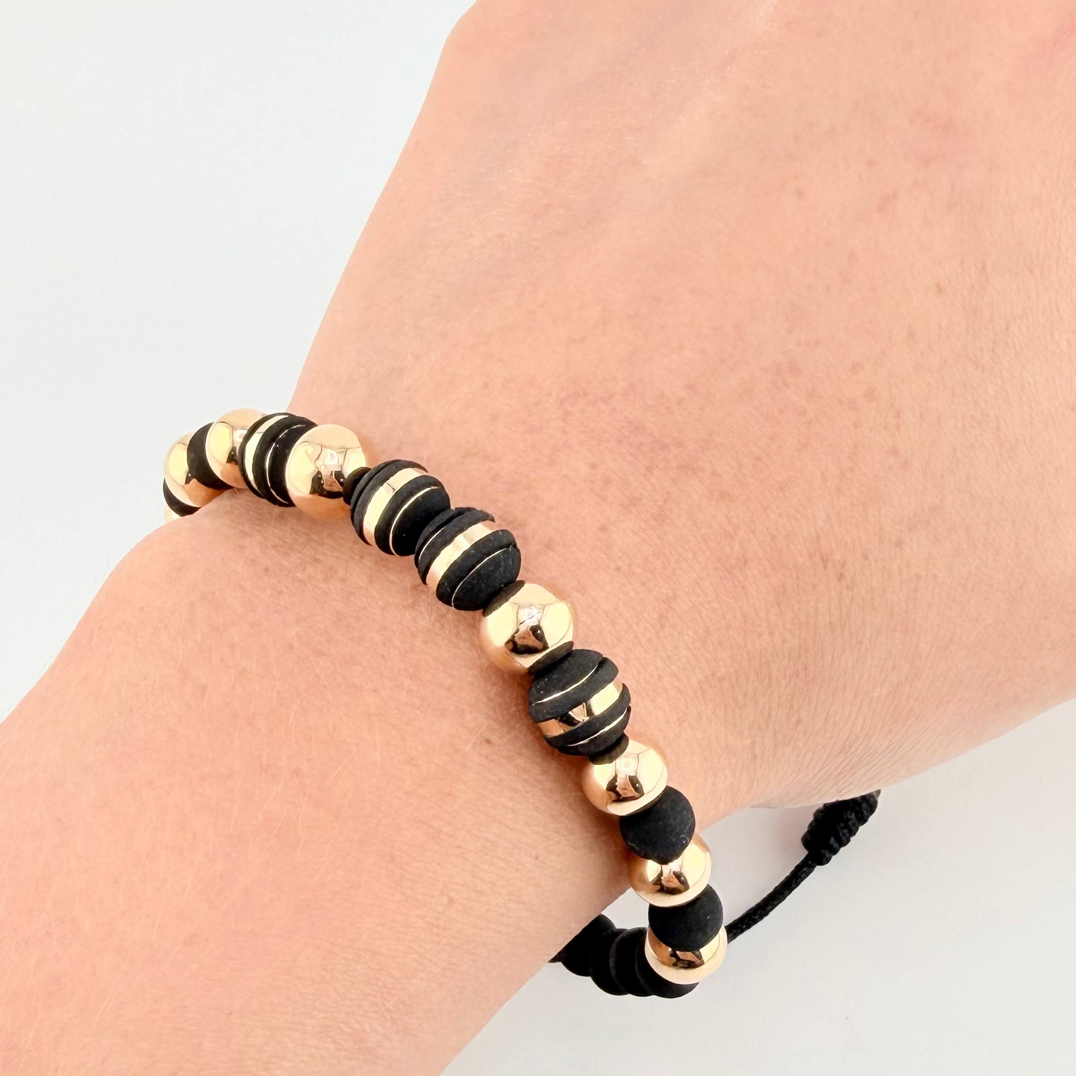 Pulsera Negra Neoros 4und Bolas 8und / 7mm-8mm Oro Amarillo 18K *