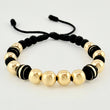 Pulsera Negra Neoros 4und Bolas 10und 3.1gr / 8mm Oro Amarillo 18K *