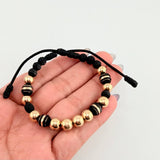 Pulsera Negra Neoros 4und Bolas 10und 3.1gr / 8mm Oro Amarillo 18K *
