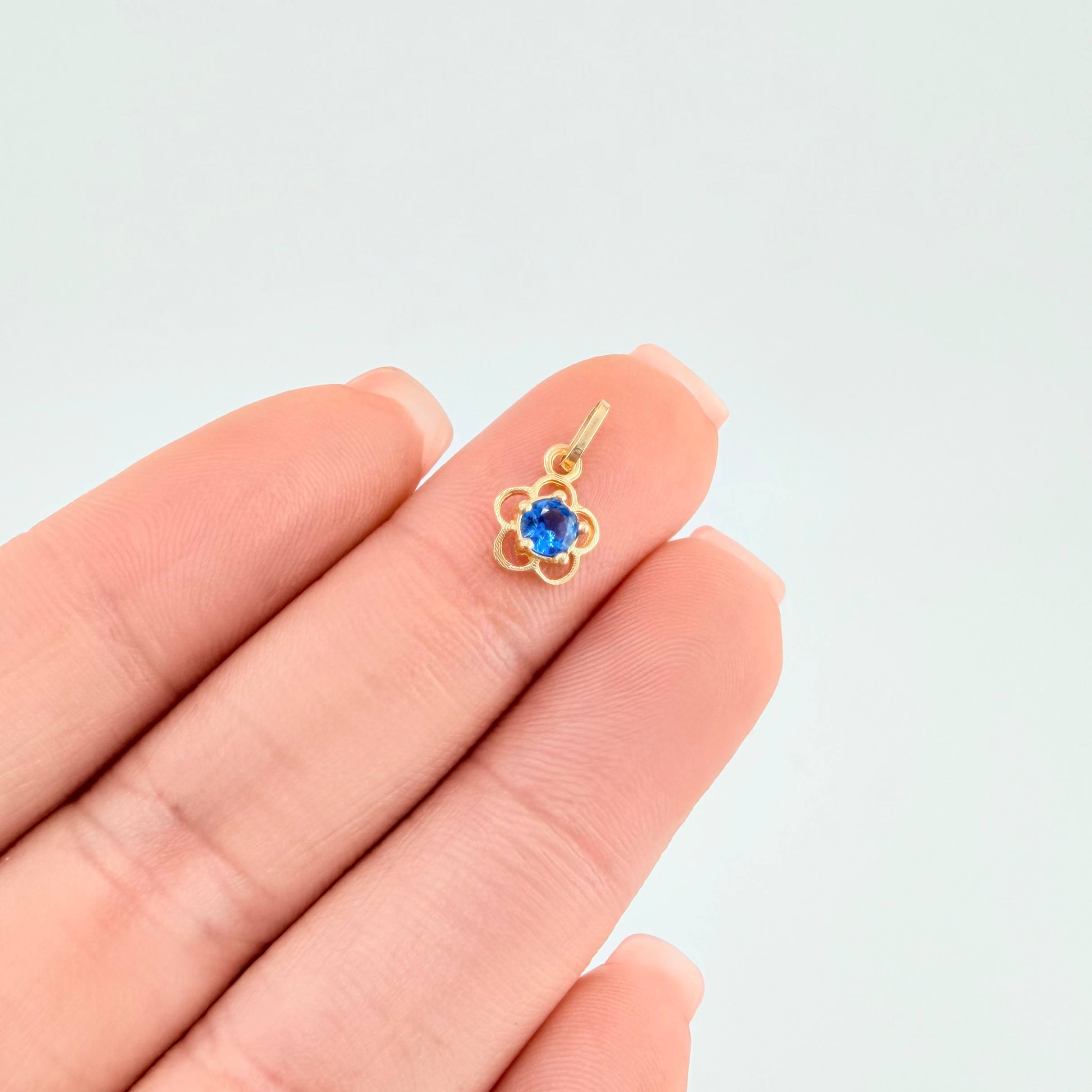 Dije Flor 0.4gr / 1.3cm / Oro Amarillo 18K