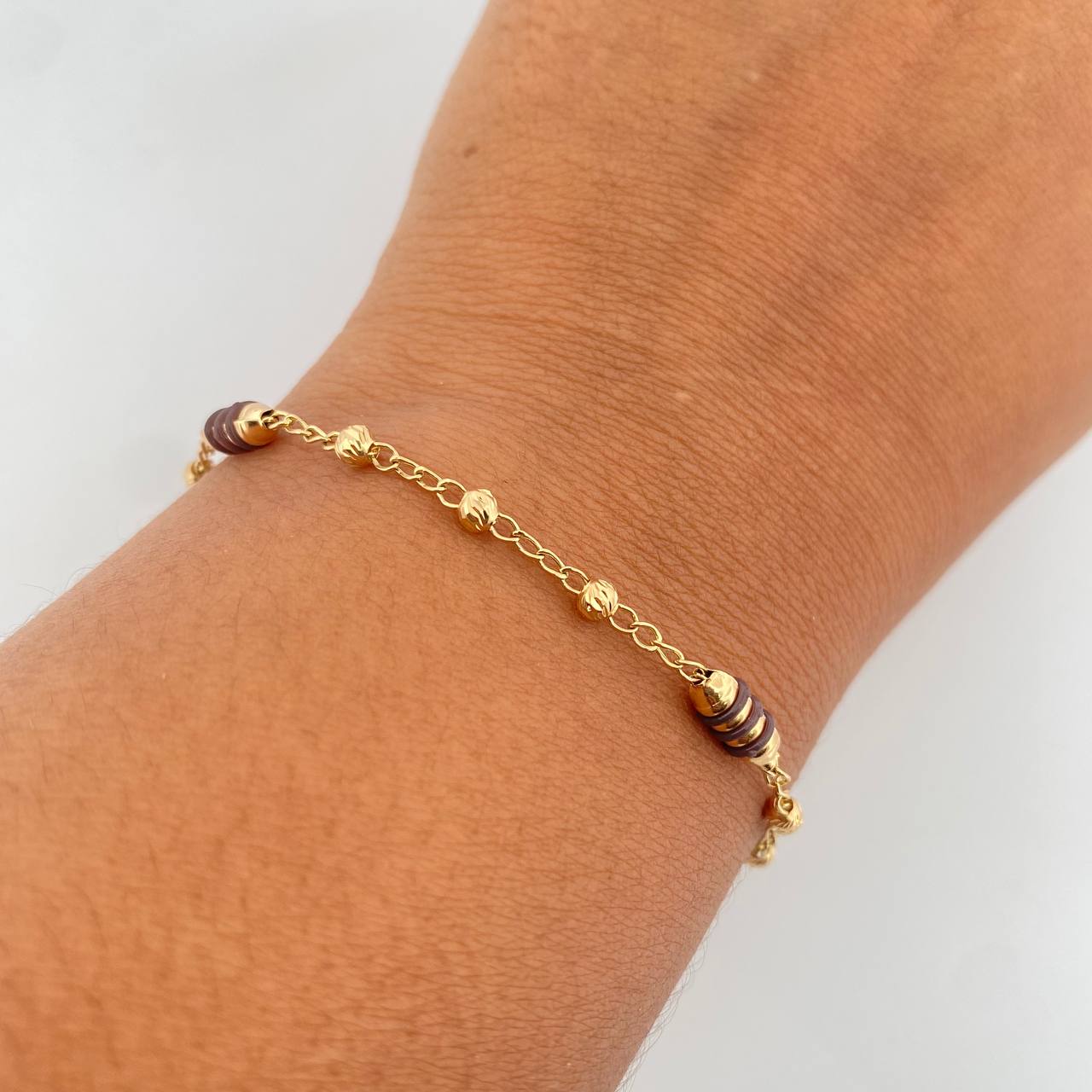 Pulso Barril 2.65gr / 18cm / 3mm Bolas Diamantadas Cauchos Cafes Oro Amarillo 18K $