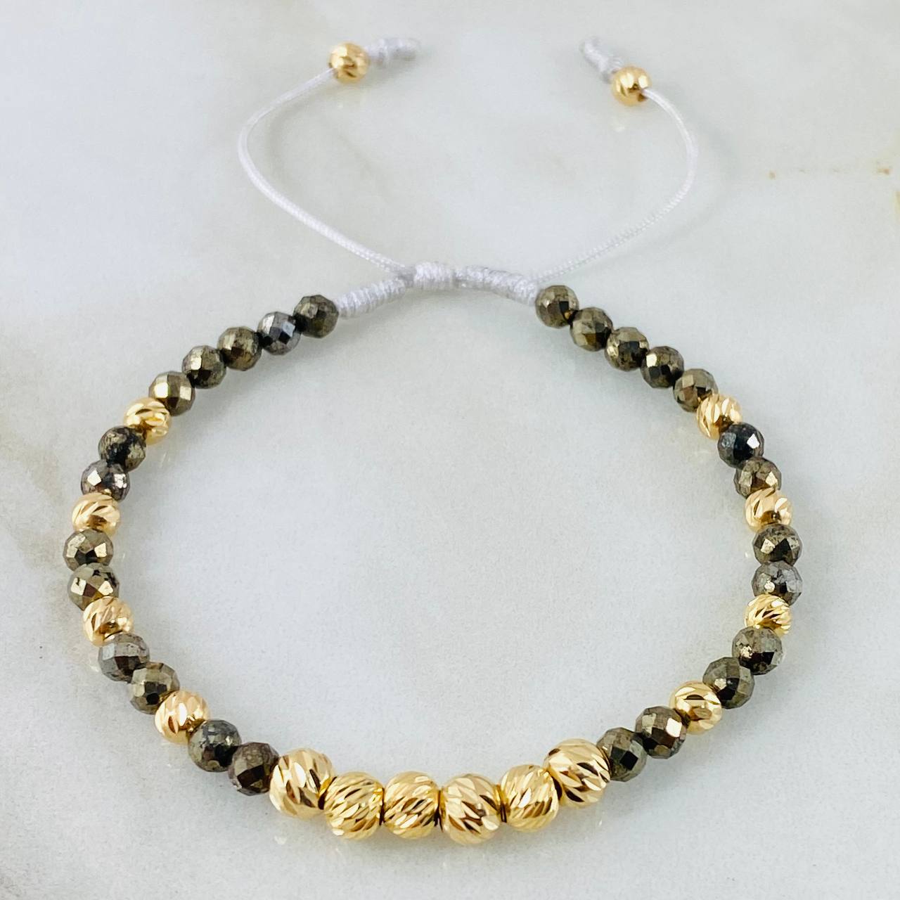 Pulsera Hueso Pirita Grisacea 2.05gr / Oro Amarillo 18K (A.C)