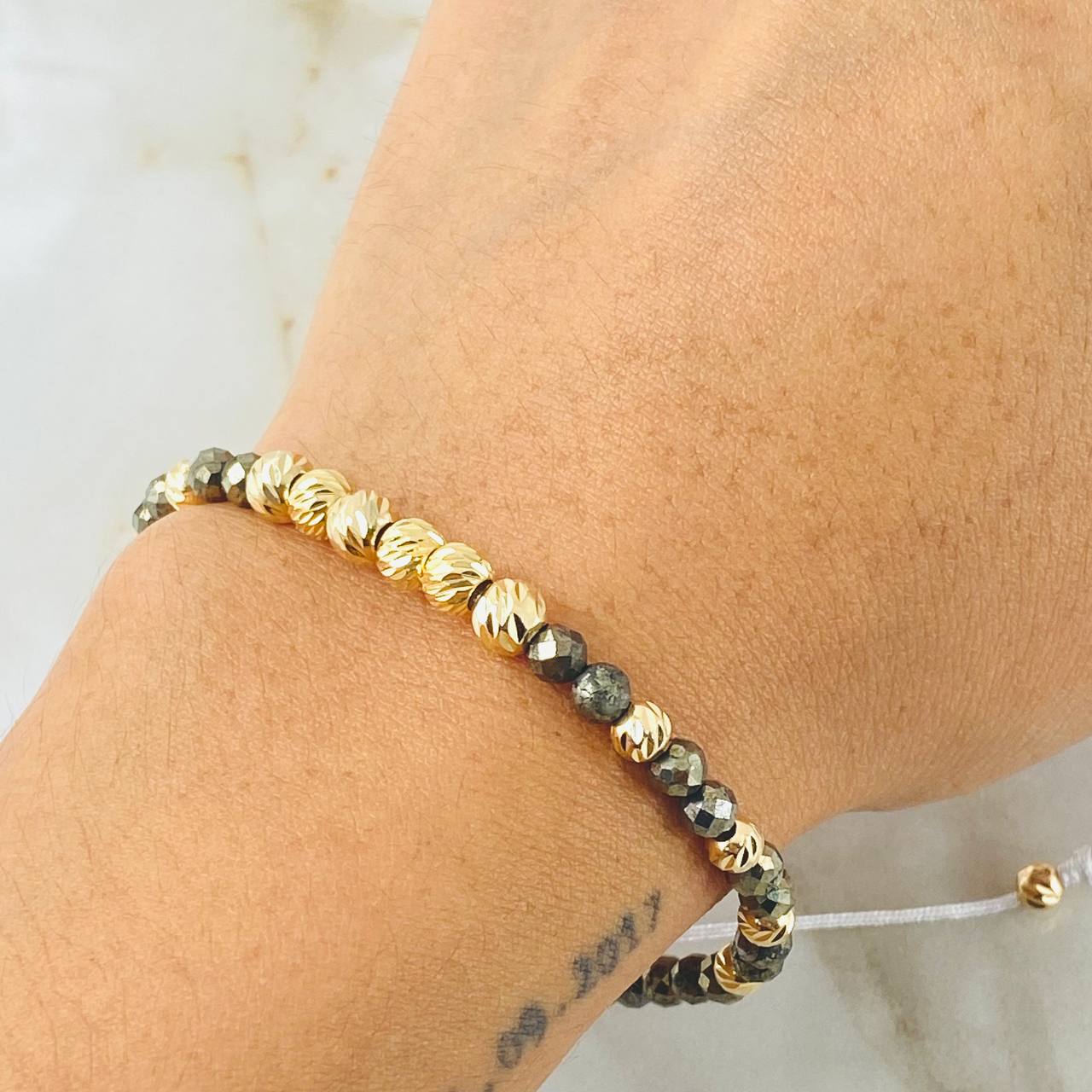 Pulsera Hueso Pirita Grisacea 2.05gr / Oro Amarillo 18K (A.C)