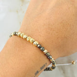 Pulsera Hueso Pirita Grisacea 2.05gr / Oro Amarillo 18K (A.C)