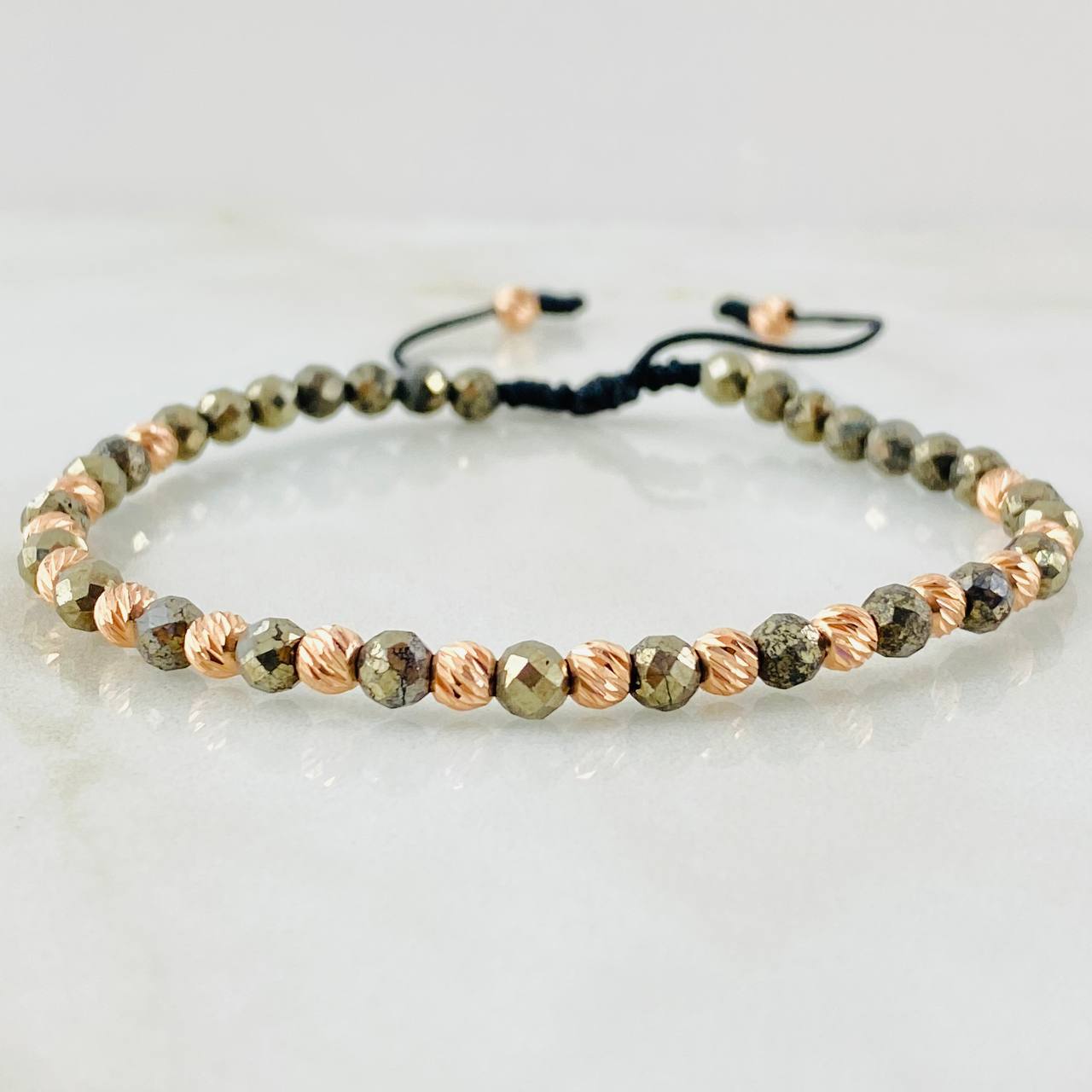 Pulsera Negra Pirita Grisacea 1.7gr / Oro Rosa 18K (A.C)