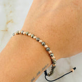 Pulsera Negra Pirita Grisacea 1.7gr / Oro Rosa 18K (A.C)