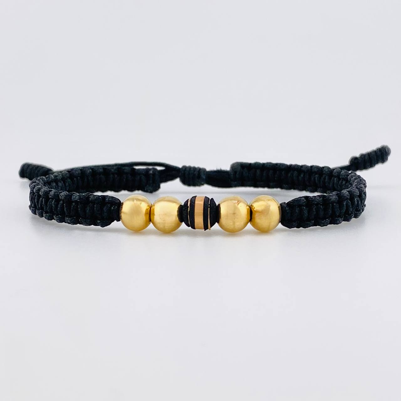 Pulsera Tejida Hilo Negro 4 Balines Lisos y Un Neoro Oro Amarillo 18K