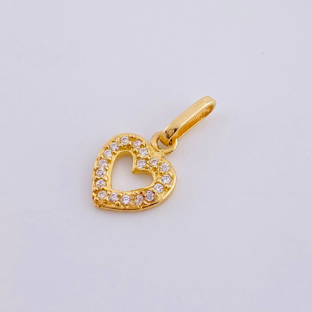 Dije Silueta Corazón Tupido 0.75gr / 1.6cm / Oro Amarillo 18K *