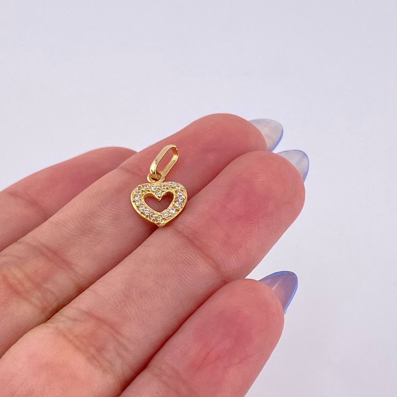 Dije Silueta Corazón Tupido 0.75gr / 1.6cm / Oro Amarillo 18K *