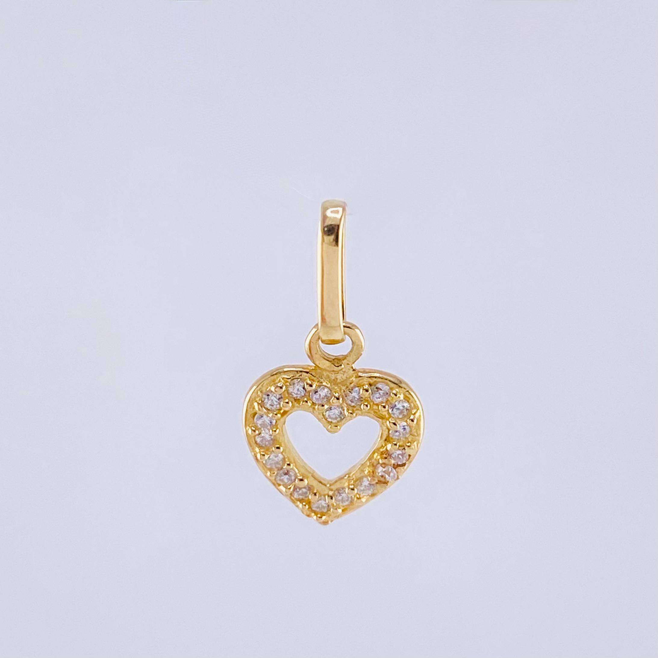 Dije Silueta Corazón Tupido 0.75gr / 1.6cm / Oro Amarillo 18K *