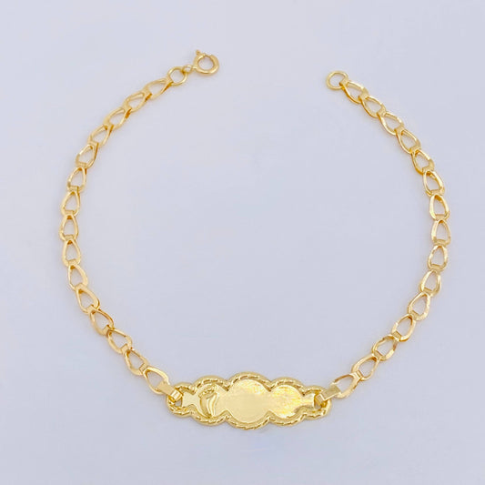 Pulso Bebé Espiga Placa pie Nuve Bordeada 1.2gr / 14.5cm / 2.7mm Oro Amarillo 18K