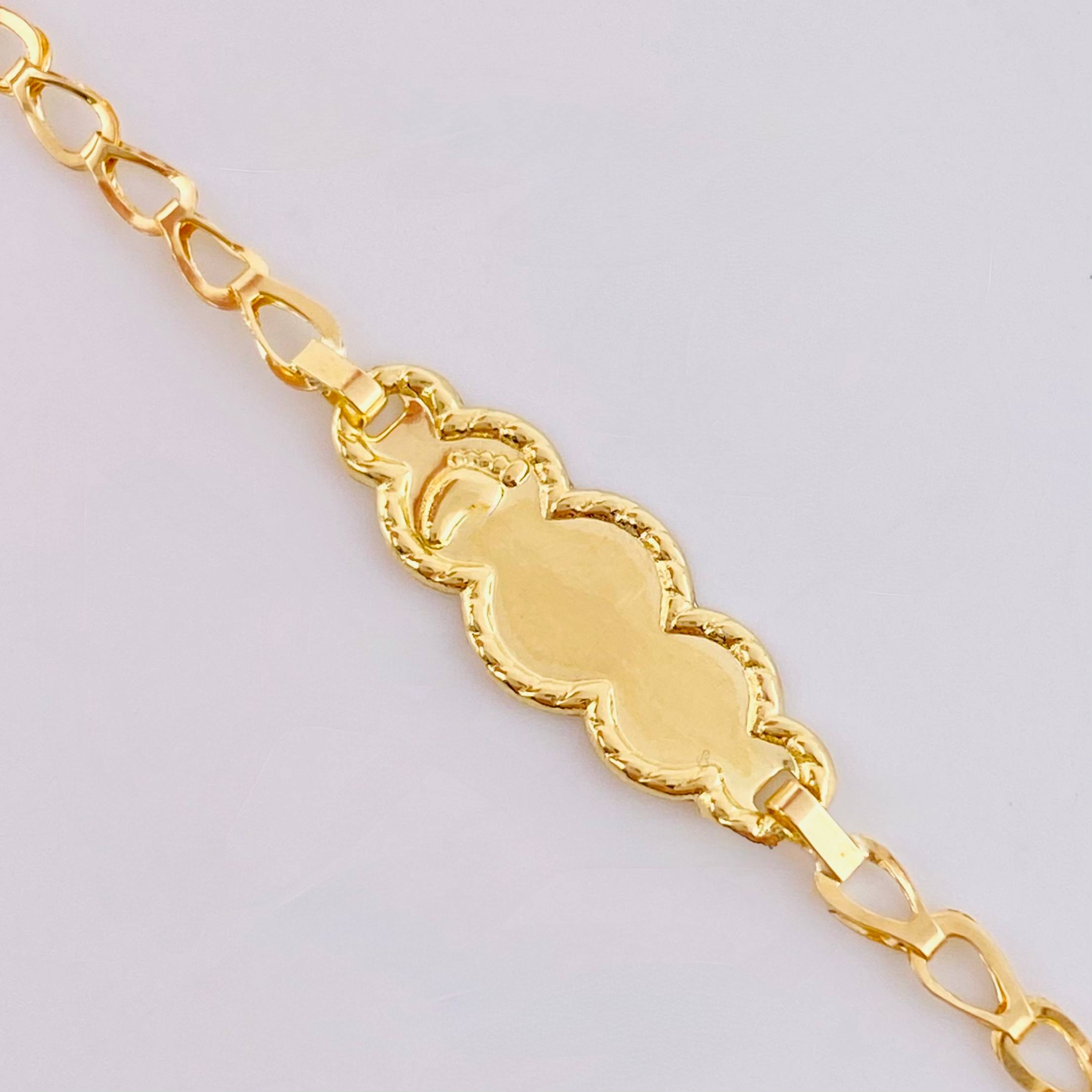Pulso Bebé Espiga Placa pie Nuve Bordeada 1.2gr / 14.5cm / 2.7mm Oro Amarillo 18K