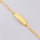 Pulso Bebé Espiga Placa Ovalada  Bordeada 1.2gr / 14.5cm / 2.7mm Oro Amarillo 18K ©