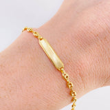 Pulso Bebé Gc Placa Rectangular Curva 1.5gr / 14.5cm / 3.2mm Oro Amarillo 18K