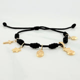 Pulsera Tejida Negra Seis Nudos Oro Amarillo 18K