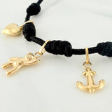 Pulsera Tejida Negra Seis Nudos Oro Amarillo 18K