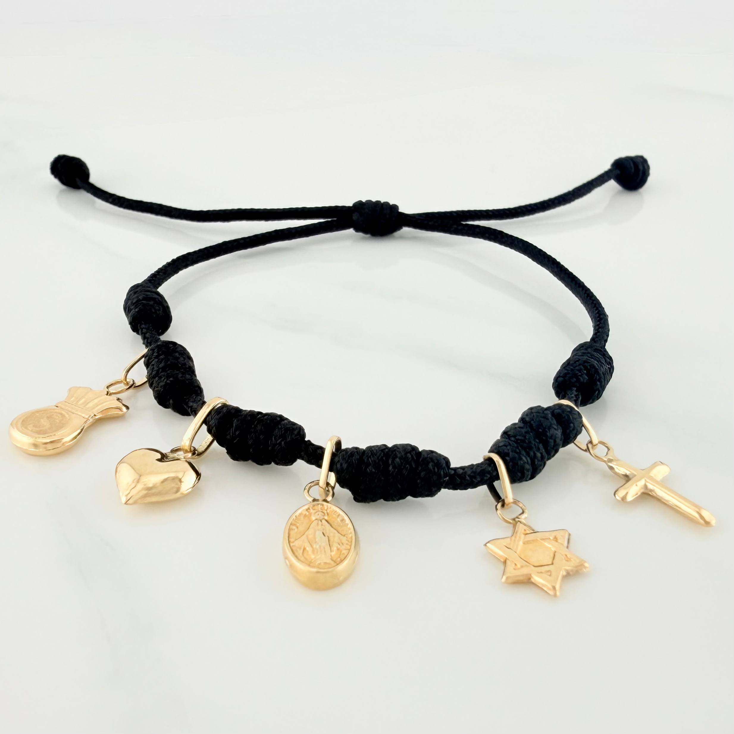 Pulsera Tejida Negra Seis Nudos Oro Amarillo 18K