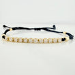 Pulsera Tejida Negra Tennis Oro Amarillo 18K