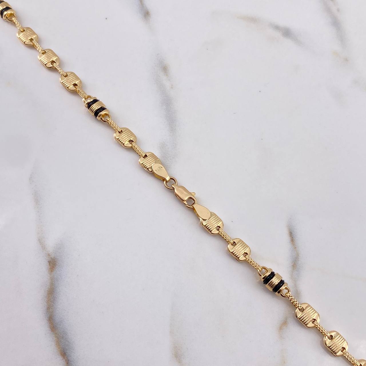 Cadena Rustica Canotillo 13.5gr / 61.5cm / 5.6mm Barril Cauchos Negros Oro Amarillo 18K $