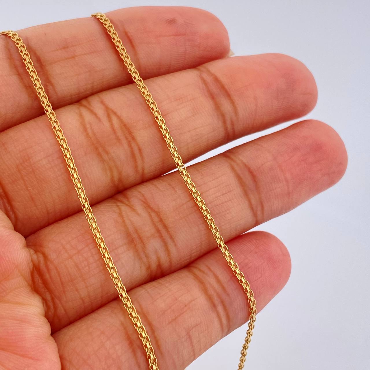 Cadena China 3.1gr / 60.4cm / Oro Amarillo +1 18K $