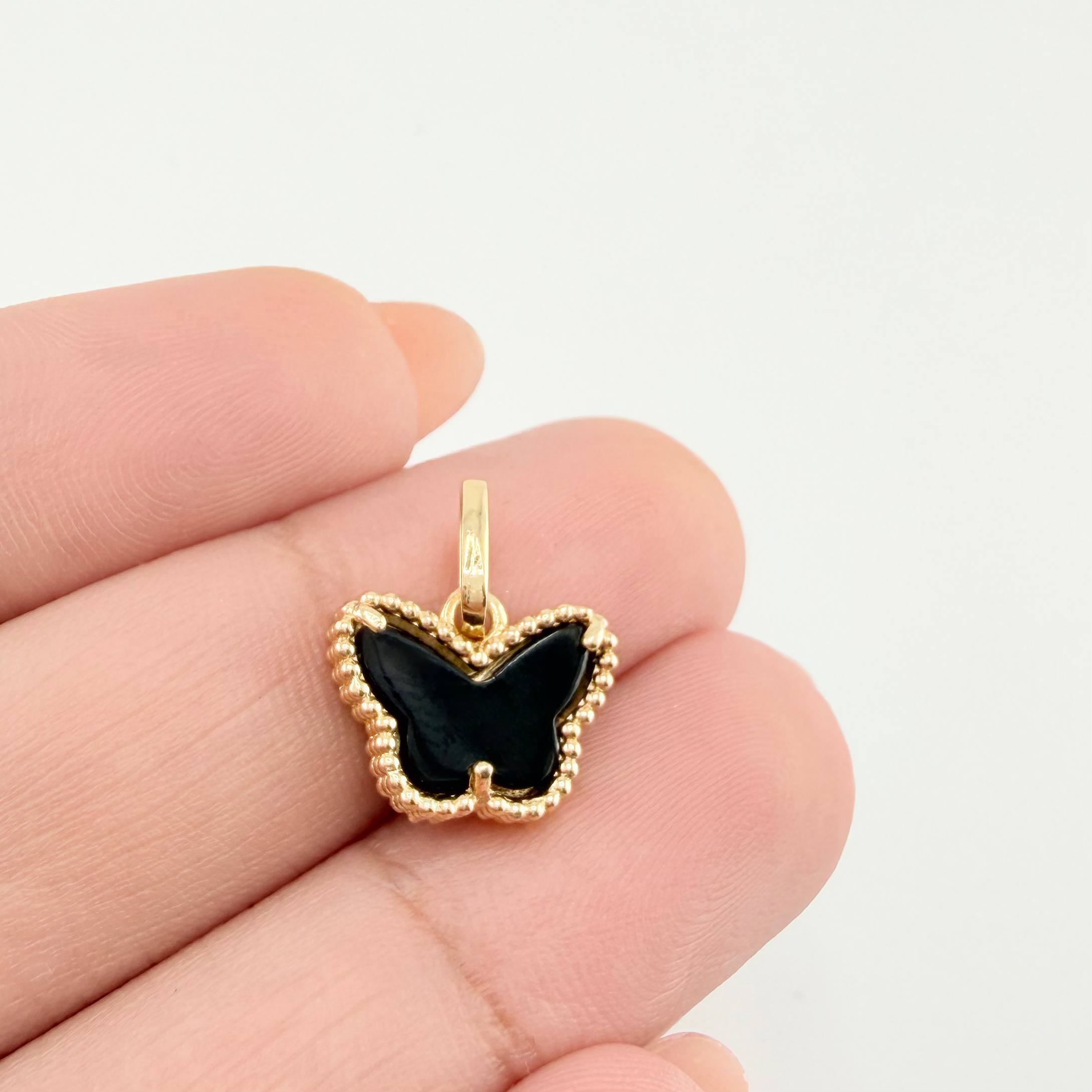 Dije Mariposa 1.5gr / 1.5cm / Oro Amarillo Nac.Esp. 18K *