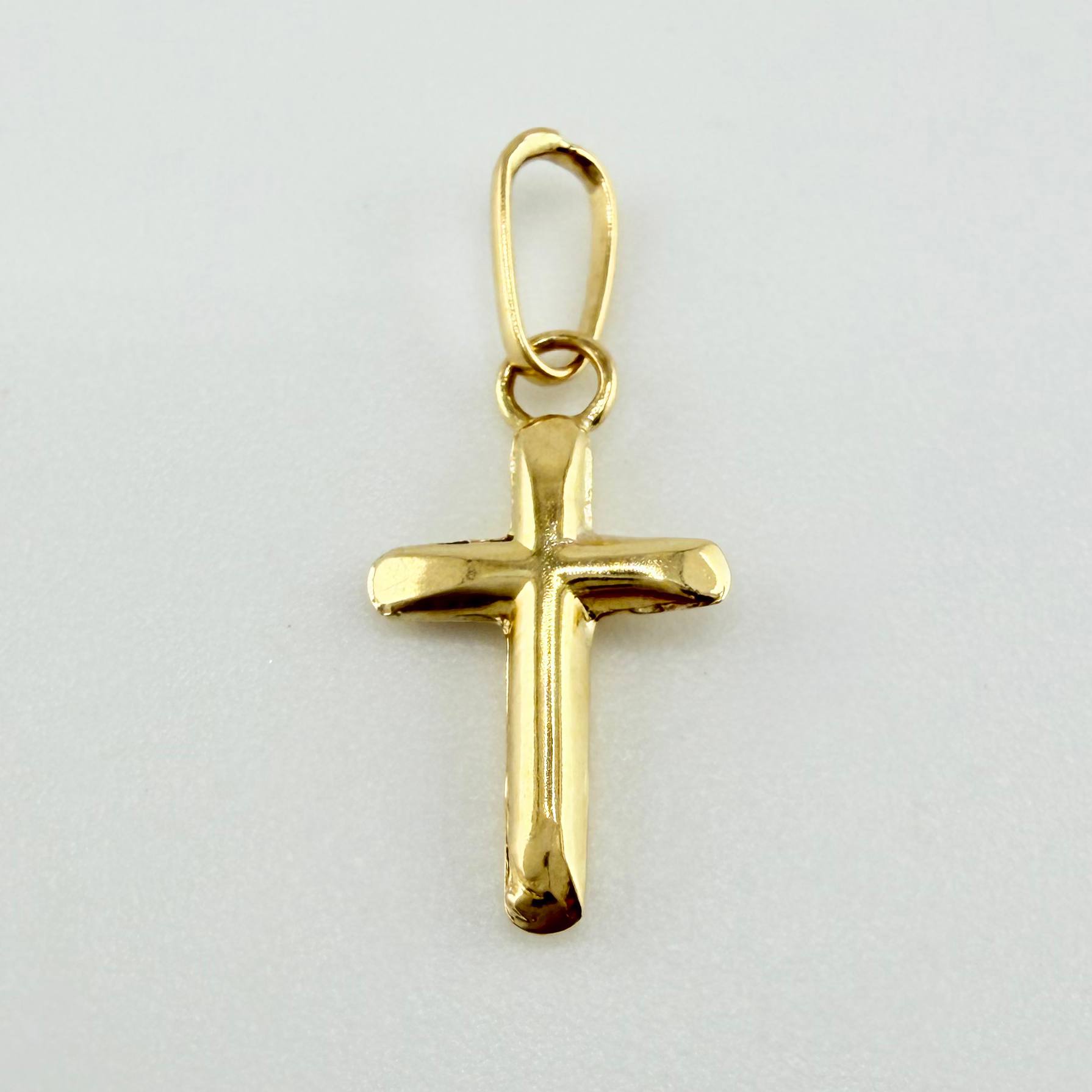 Dije Cruz 0.2gr / 1.6cm / Oro Amarillo 18K