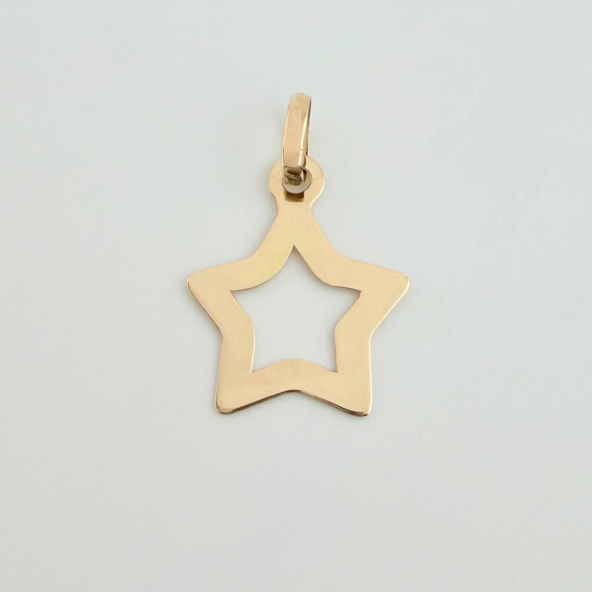 Dije Estrella Silueta 0.45gr / 2cm / Oro Amarillo 18K
