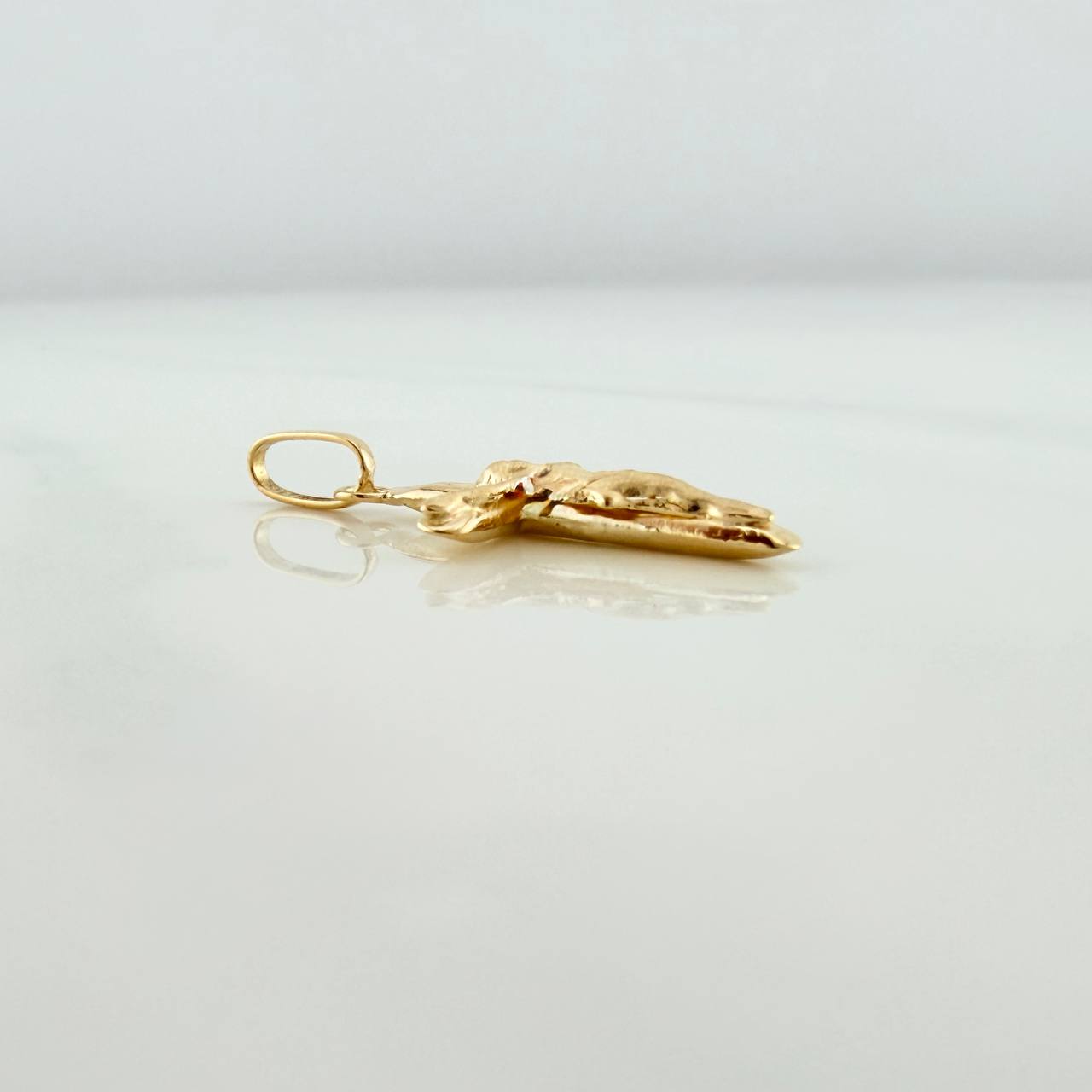 Dije Cruz Cristo 0.7gr / 3cm / Oro Amarillo 18K %