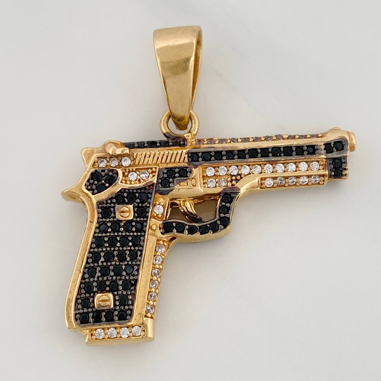 Dije Pistola 11.75gr / 3.4cm / Dos Oros Negro Amarillo 18K