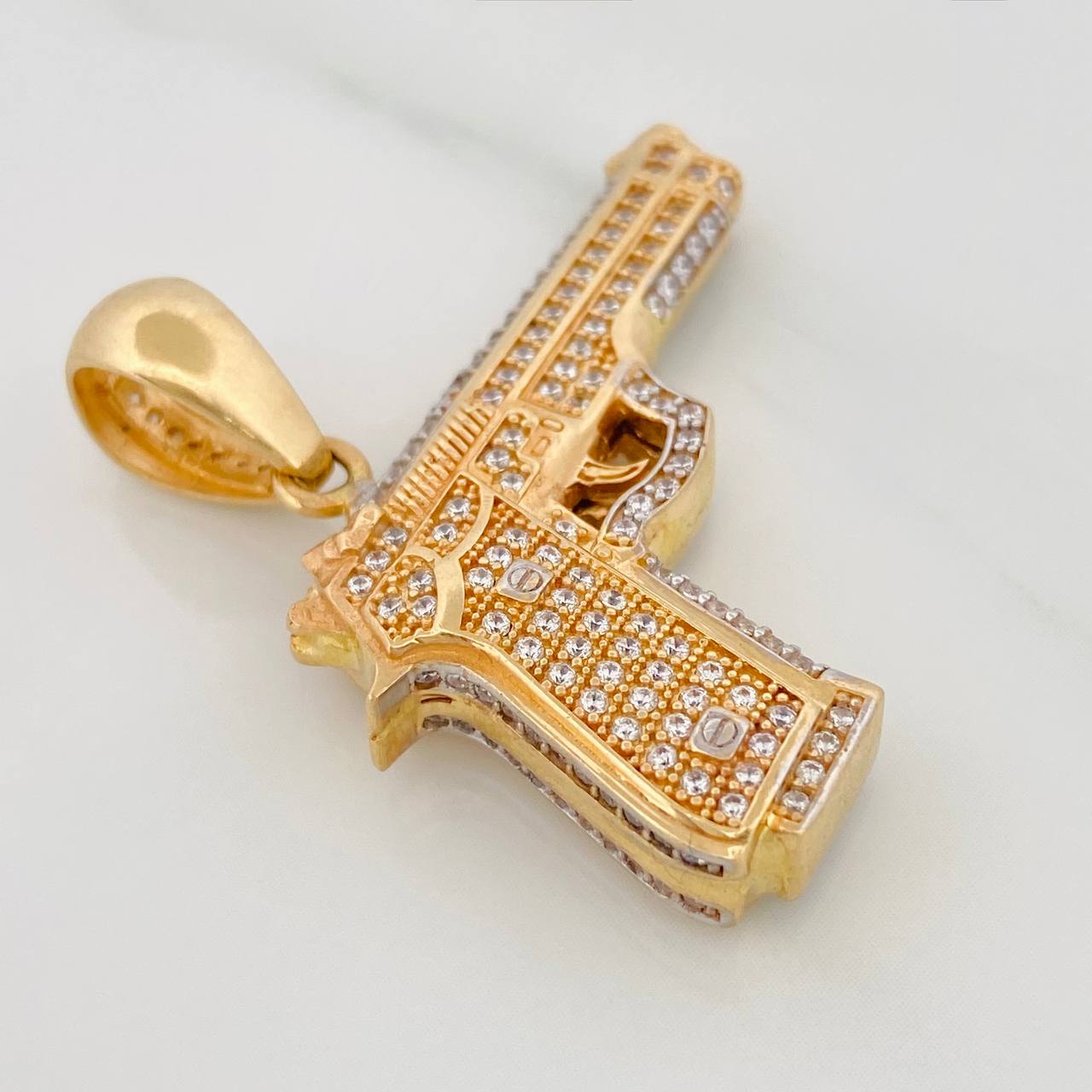 Dije Pistola 11.6gr / 3.5cm / Dos Oros Amarillo Blanco 18K
