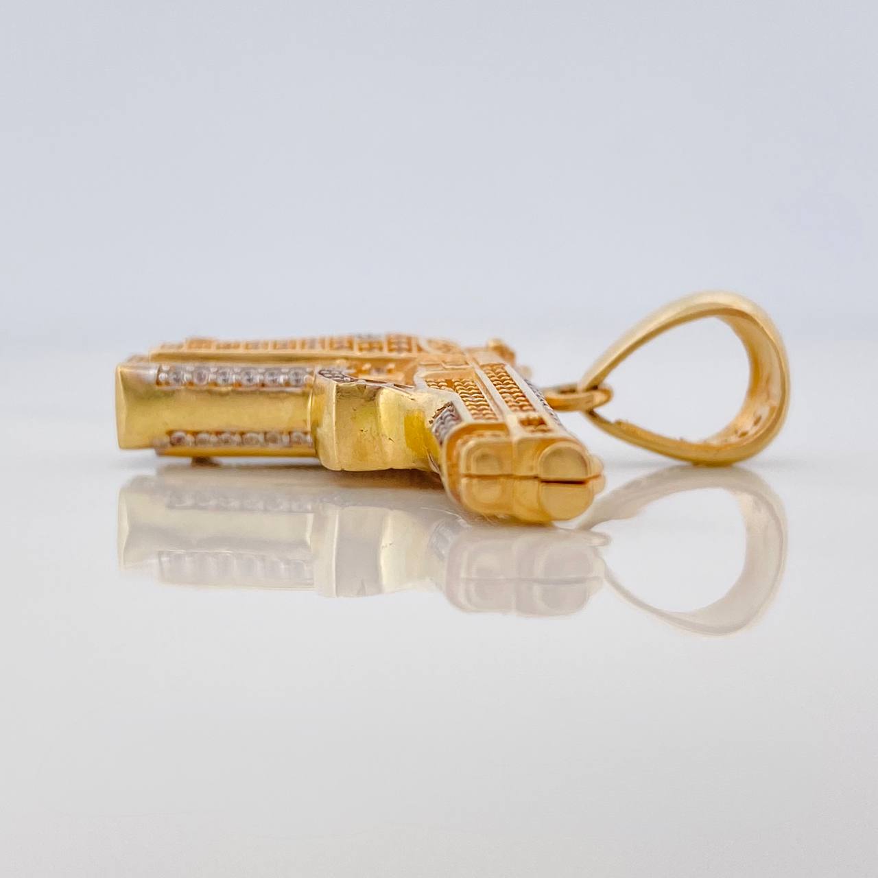 Dije Pistola 11.6gr / 3.5cm / Dos Oros Amarillo Blanco 18K