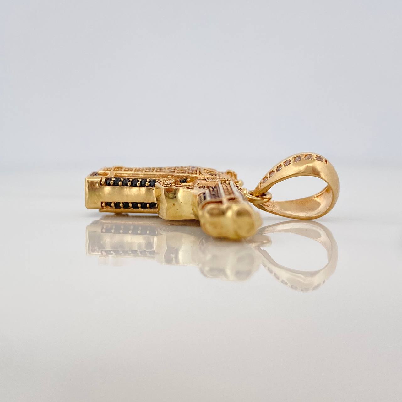 Dije Pistola 12.6gr / 3.5cm / Oro Amarillo 18K $