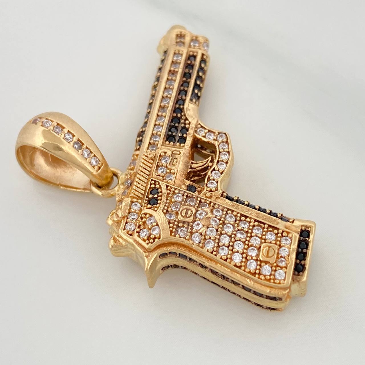 Dije Pistola 12.6gr / 3.5cm / Oro Amarillo 18K $