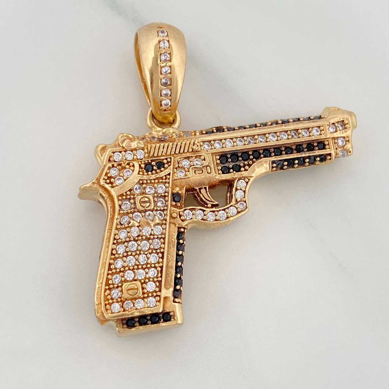 Dije Pistola 12.6gr / 3.5cm / Oro Amarillo 18K $