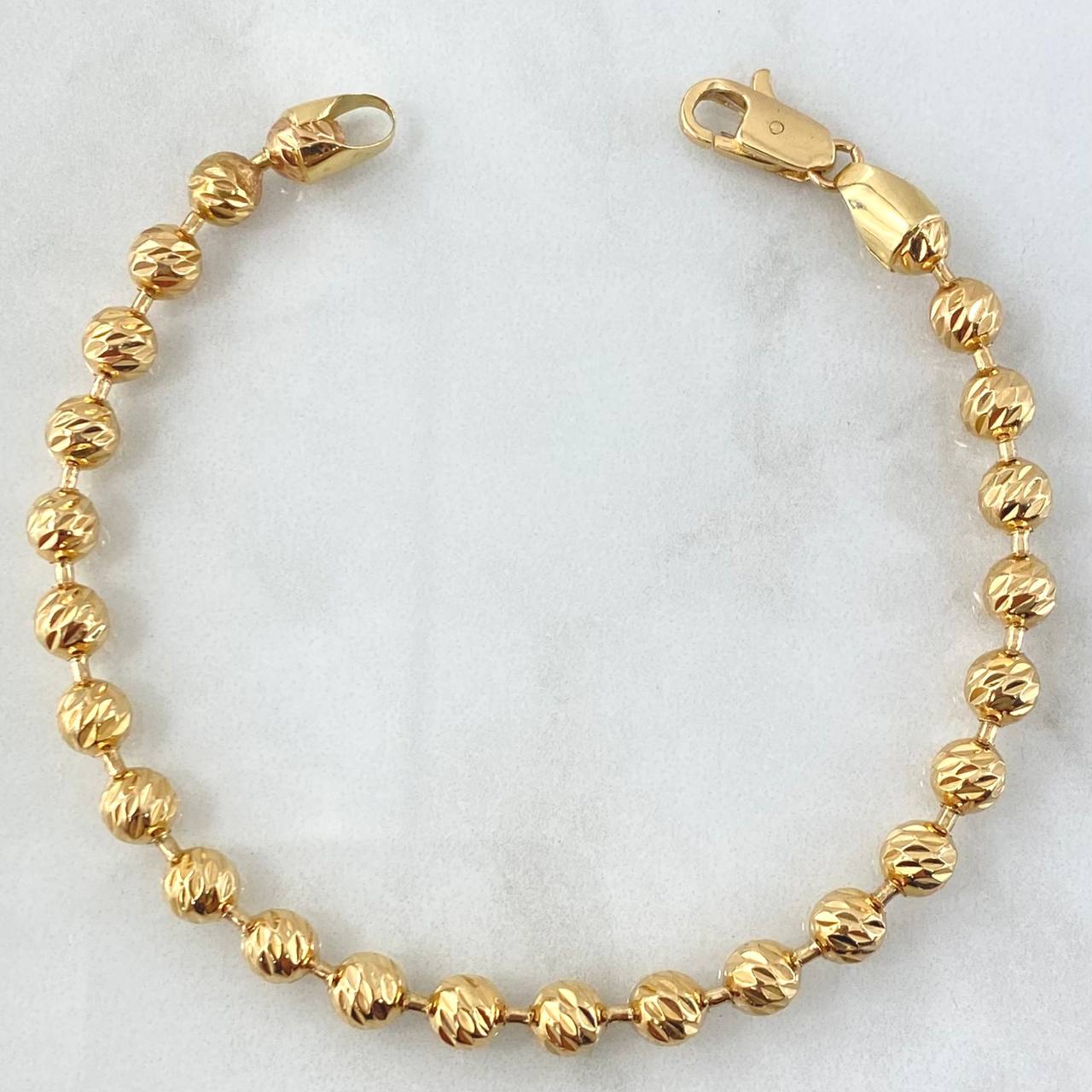 Pulso Militar 15.55gr / 21cm / 5.7mm Bolas Diamantadas Oro Amarillo 18K