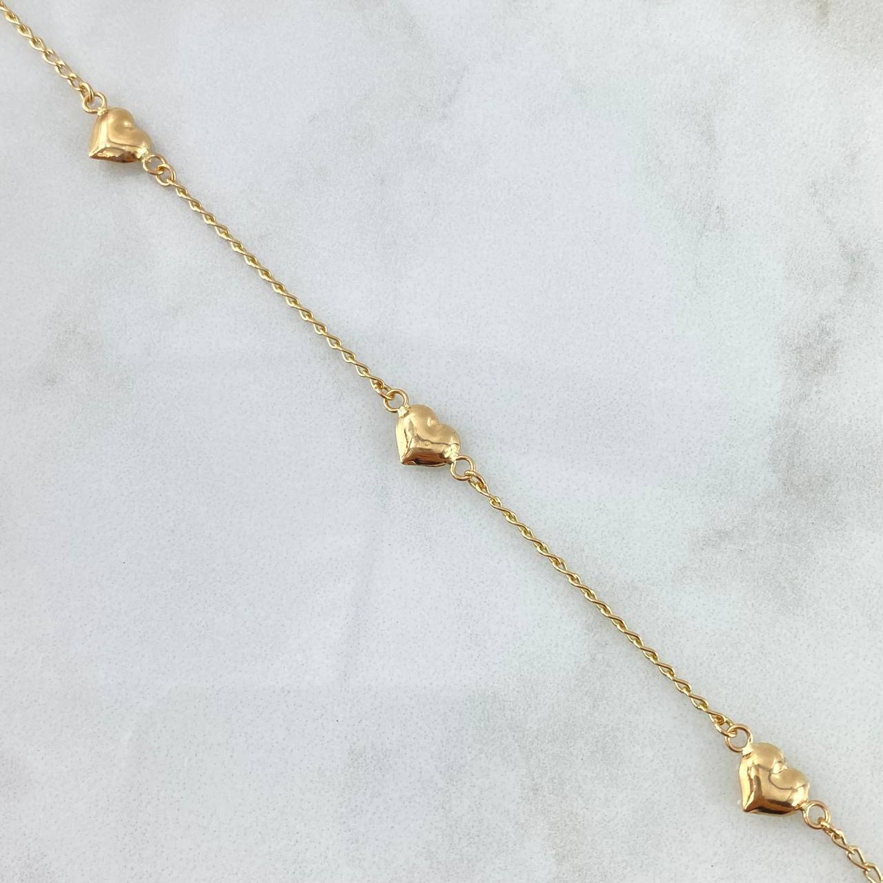 Tobillera Espiga Corazones 2.8gr / 25.5cm / 1.3mm Troquelado Liso Oro Amarillo 18K