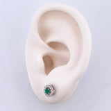 Topos Halo Movil 2.25gr / 6.7mm Esmeraldas 36Pts - Diamantes Blancos 25Pts Oro Blanco 18K (Joya)