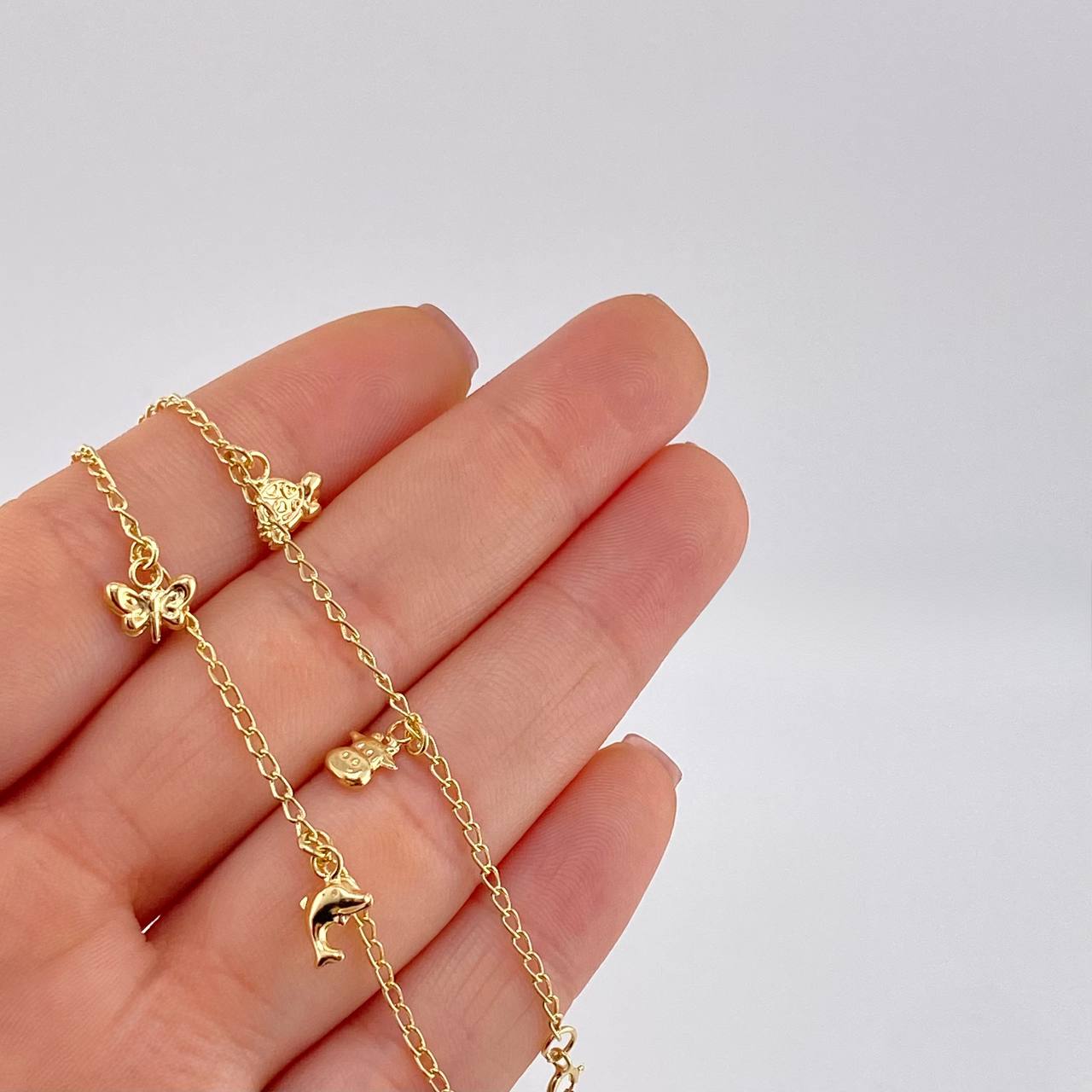 Pulso Espiga Dijes Animales 2.6 g / 19 cm / 1.6 mm Oro Amarillo 18K