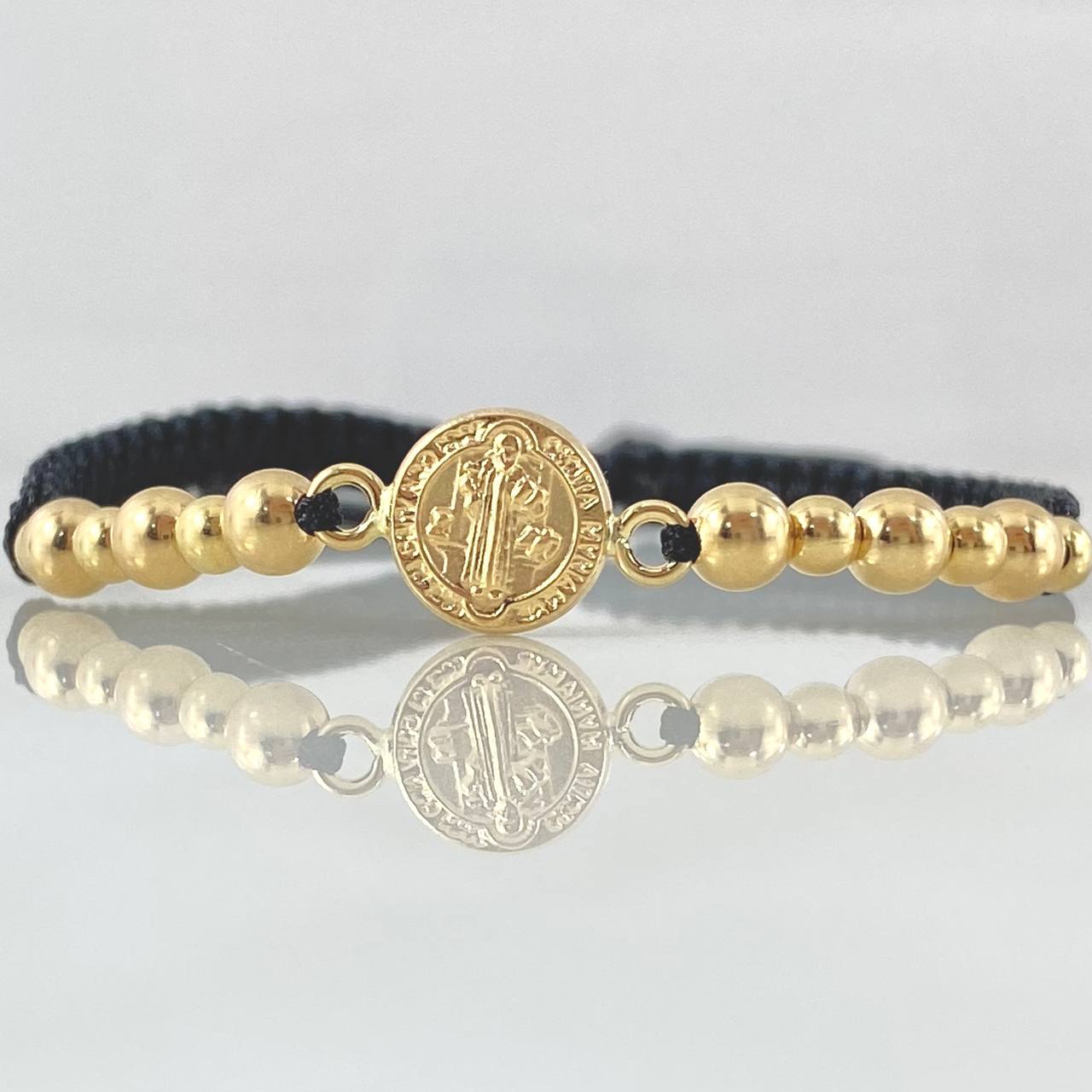Pulsera Negra San Benito 1.25gr / Oro 18K *