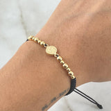 Pulsera Negra San Benito 1.25gr / Oro 18K *