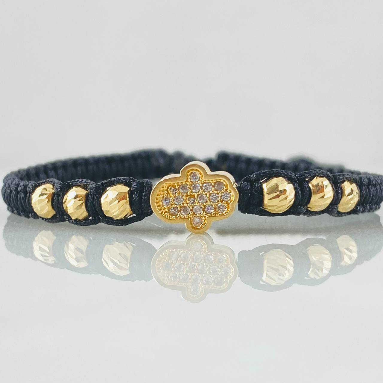 Pulsera Negra Mano Hamsa 1.65gr / Oro 18K ©