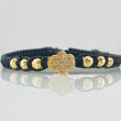 Pulsera Negra Mano Hamsa 1.65gr / Oro 18K ©