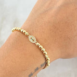 Pulsera Café Ojos Turco 2.2gr / Oro 18K