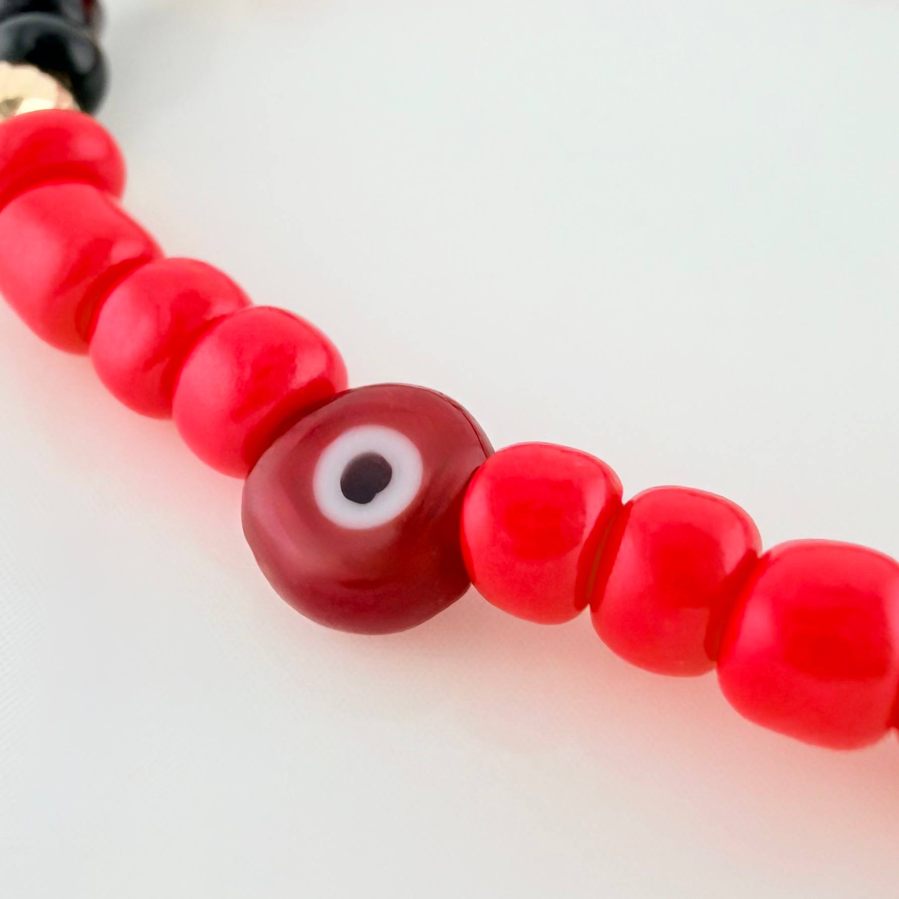 Pulsera Tejida Roja Mostacillas Ojo Turco Oro Amarillo 18K