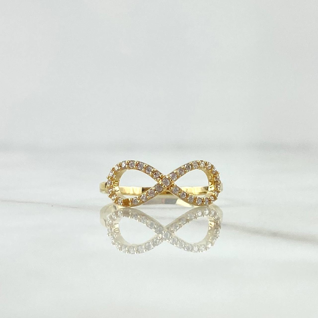 Anillo Silueta Infinito Basteado 1.3gr / T5 1/2 / Circones Blancos Oro Amarillo 18K