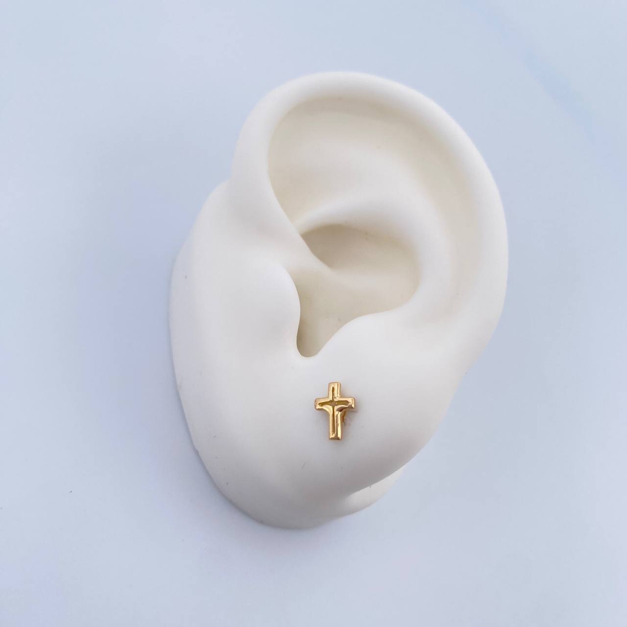 Topos Cruz Silueta 0.7gr / Oro 18K &