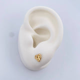 Topos Helice 0.8gr / Oro 18K &